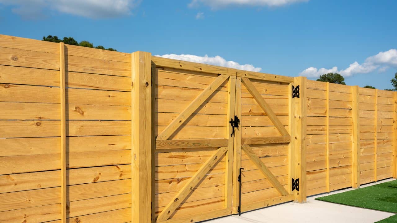 Madison fence company wood fence with gate