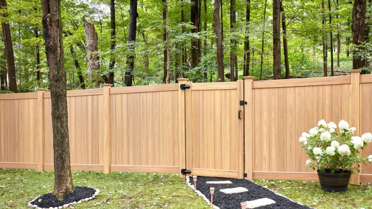 Toledo fence company chestnut vinyl fence