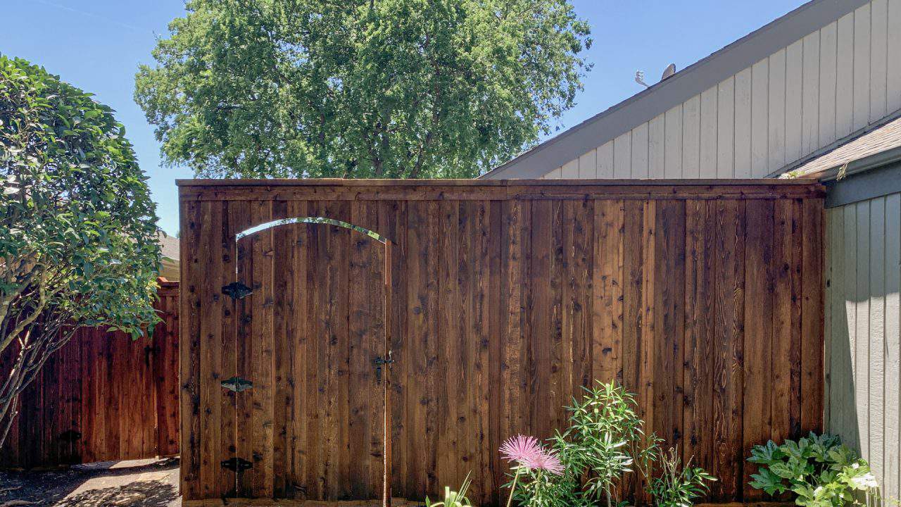 port st john fence contractor dark stained wood fence