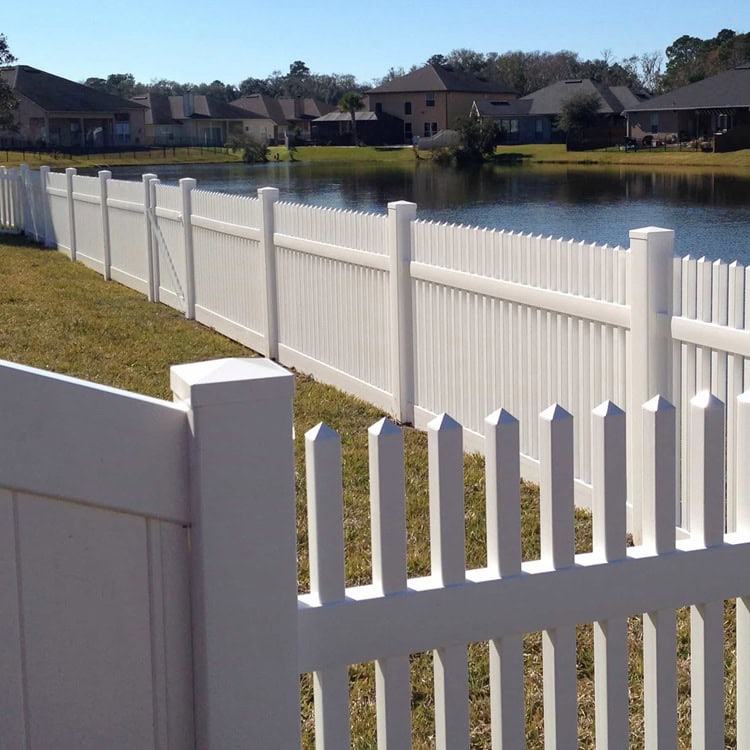 White Picket Vinyl Fence Near A Pond